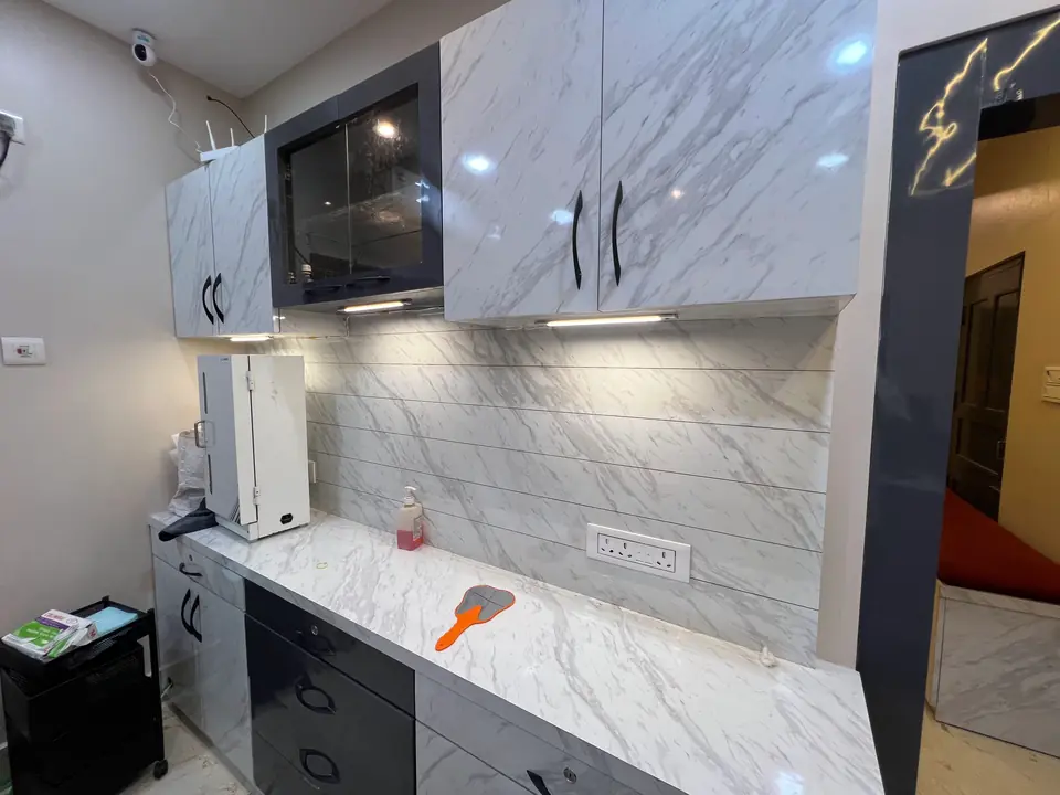 Carrara marble cabinetry inside the Smile Line clinic