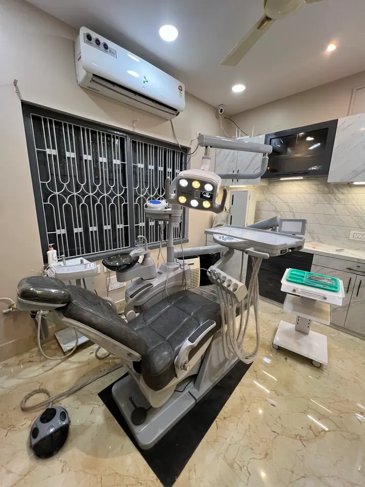 A premium operatory with a modern grey dental chair at Smile Line